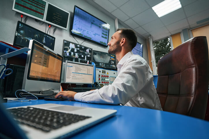 A pharma compliance officer inspecting computerized systems for regulatory adherence.