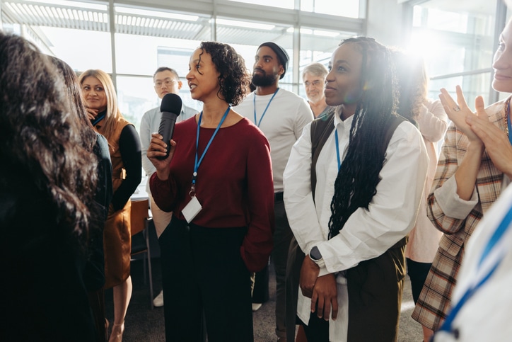 Pharmaceutical school students engage with industry professionals at a networking session.