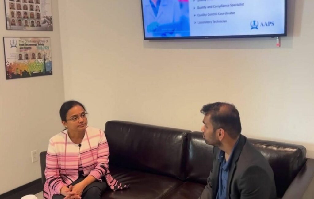 Aishwarya interacting with a member of our Career Services team during her quality assurance program